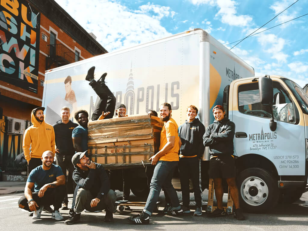The Giant Movers team handling moving boxes in Dubai